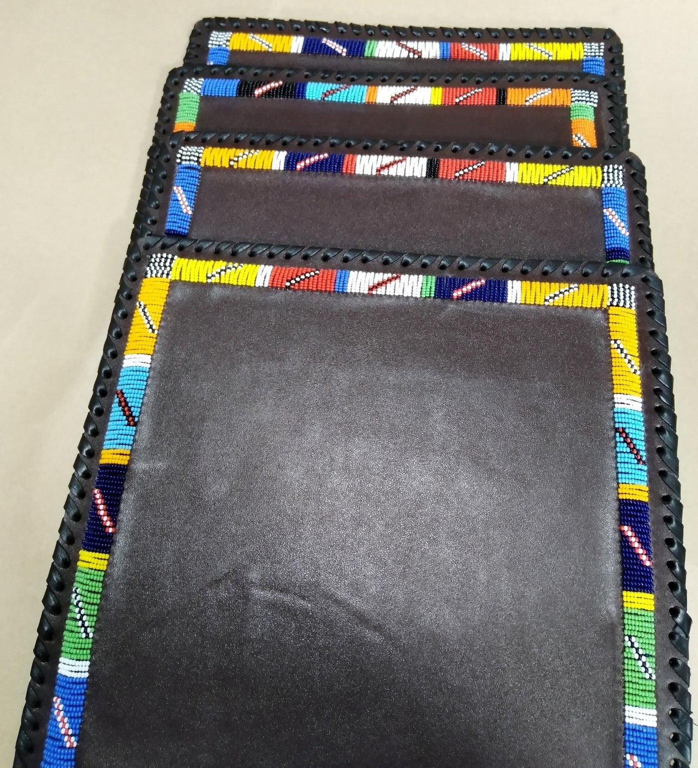 Wholesale. Handmade African Leather Beaded Placematts set of 2. Modern Homes Placemats.Customised Rectangle,square and Round Table Mats.