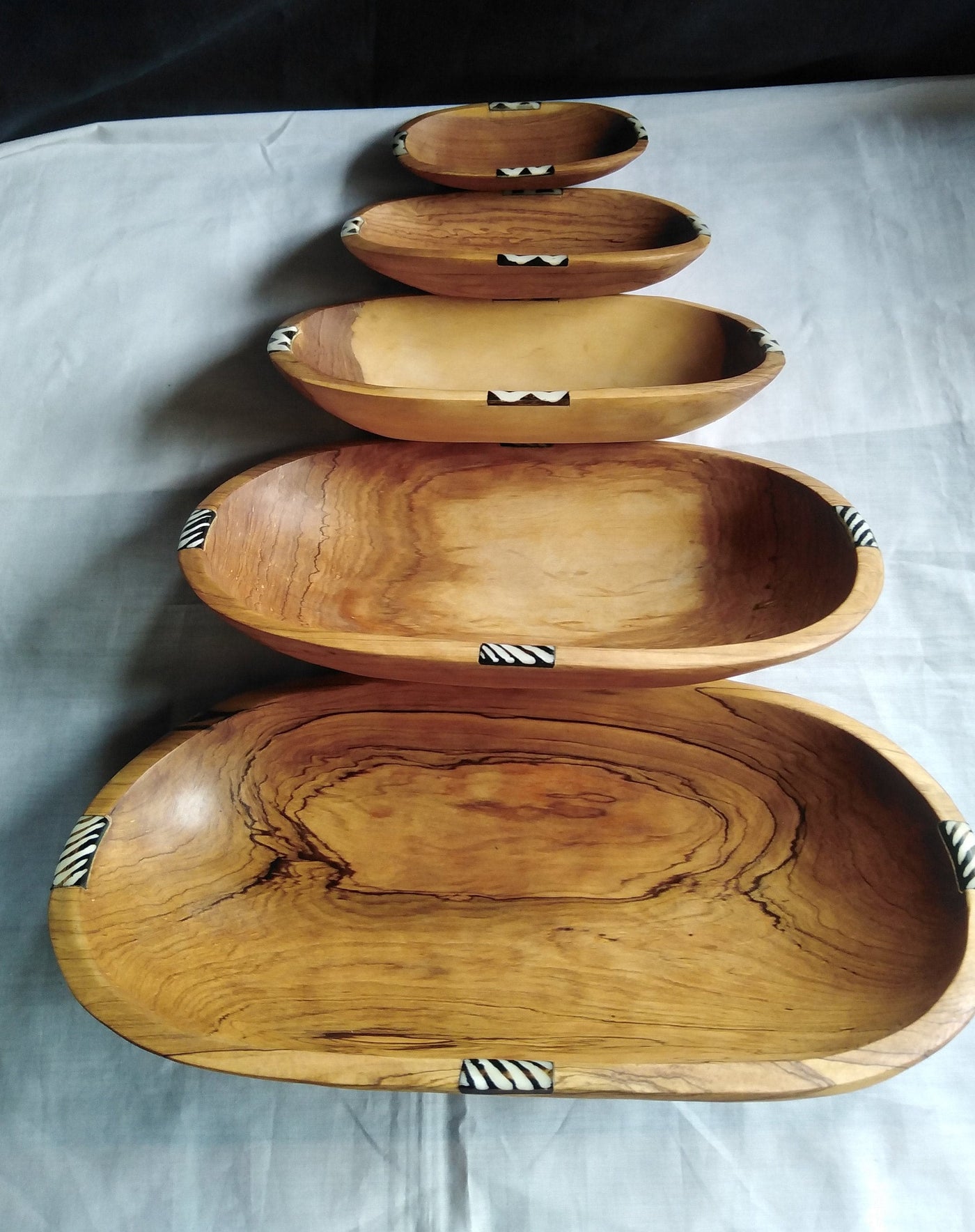 A set of 4 stackable Olive wood and Batiked Borne inlay Bowls. Rectangular smooth edges Wood and Borne Dinner Set.Servibg  Bowls.Salad Bowls