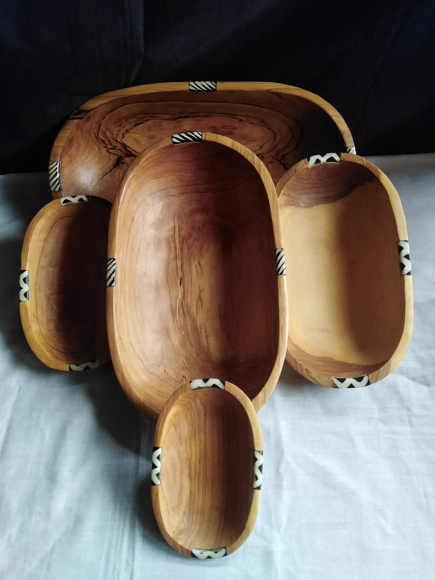 A set of 4 stackable Olive wood and Batiked Borne inlay Bowls. Rectangular smooth edges Wood and Borne Dinner Set.Servibg  Bowls.Salad Bowls