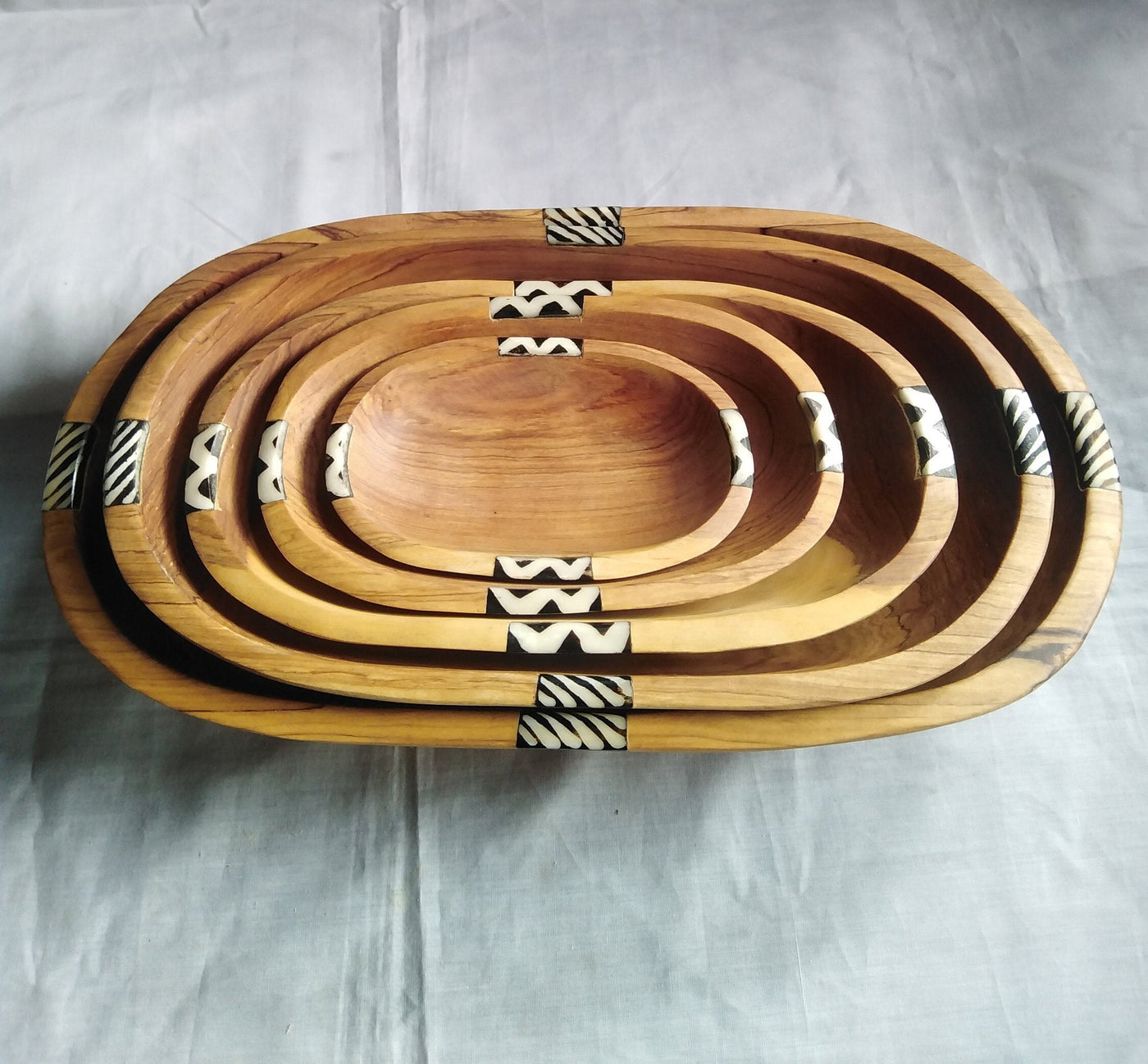 A set of 4 stackable Olive wood and Batiked Borne inlay Bowls. Rectangular smooth edges Wood and Borne Dinner Set.Servibg  Bowls.Salad Bowls