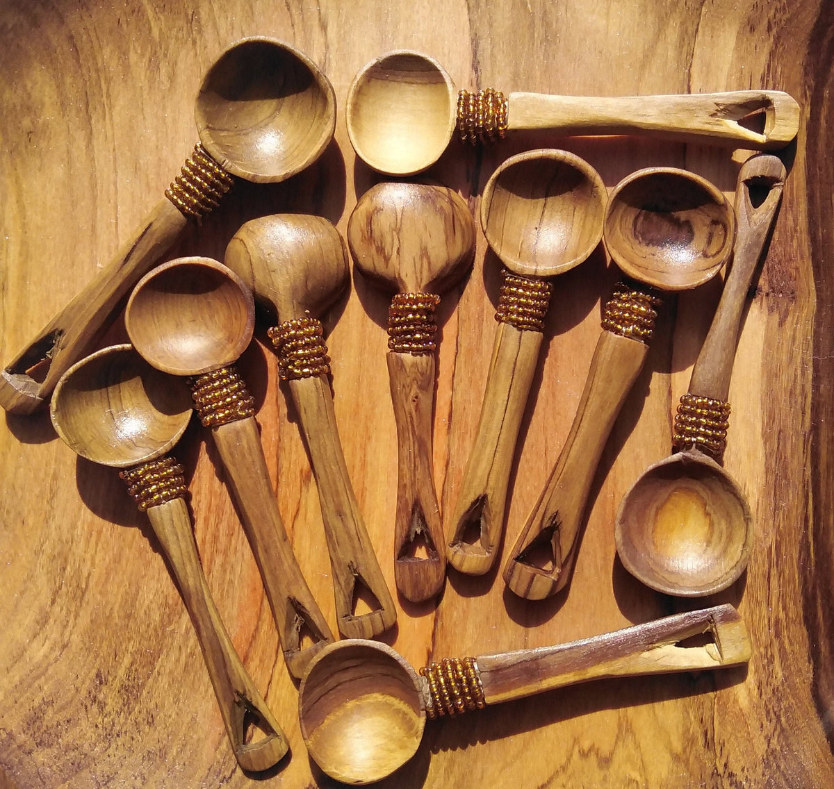 12 pieces of Olive wood with Brown Beads Spice, Salt and Sugar wooden spoons. A dozen Wood Condiments Spoons. Wholesale and Retail.