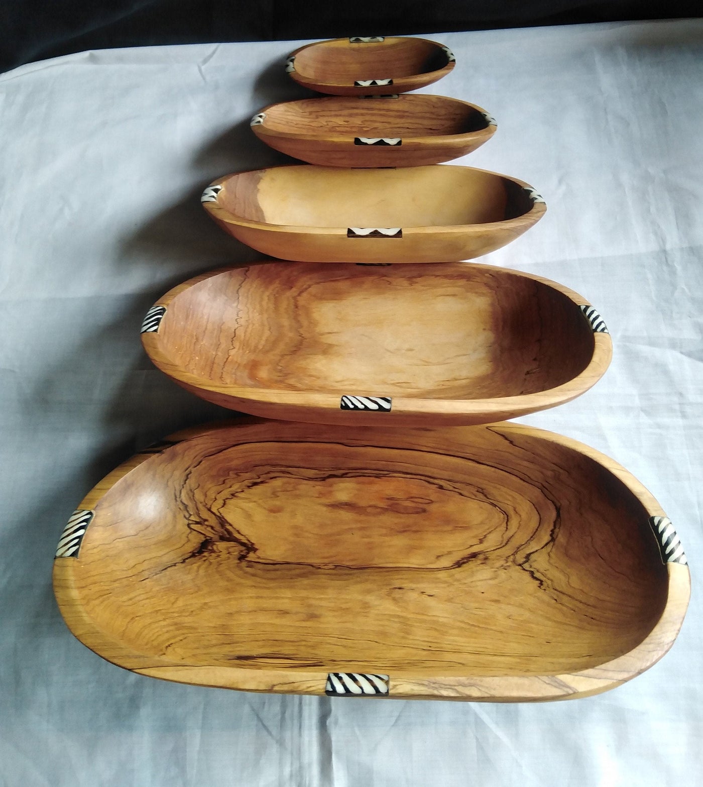 A set of 4 stackable Olive wood and Batiked Borne inlay Bowls. Rectangular smooth edges Wood and Borne Dinner Set.Servibg  Bowls.Salad Bowls