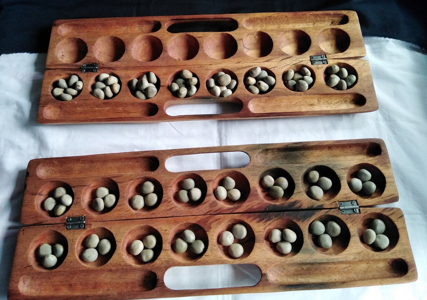 Antique Mancala Board Game. Vintage Bao Board Game. Traditional Bao Ajua Game.Hawalis Game of Oman. Omwes with Sago palm seed Balls/marbles
