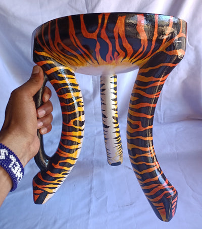 Beautiful Handmade Oval Wood enTiger Print 3 legged Stool with a handle. Modern Maasai Wildlife Themed Stool. Available in Bulk. Neo Senufo.