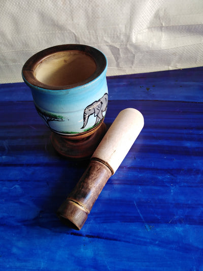 Wholesale Artistic Personalised and Painted Decorative Pestle and Mortar. Handmade African Solid wood  for Herbs and spices. Set of Four.