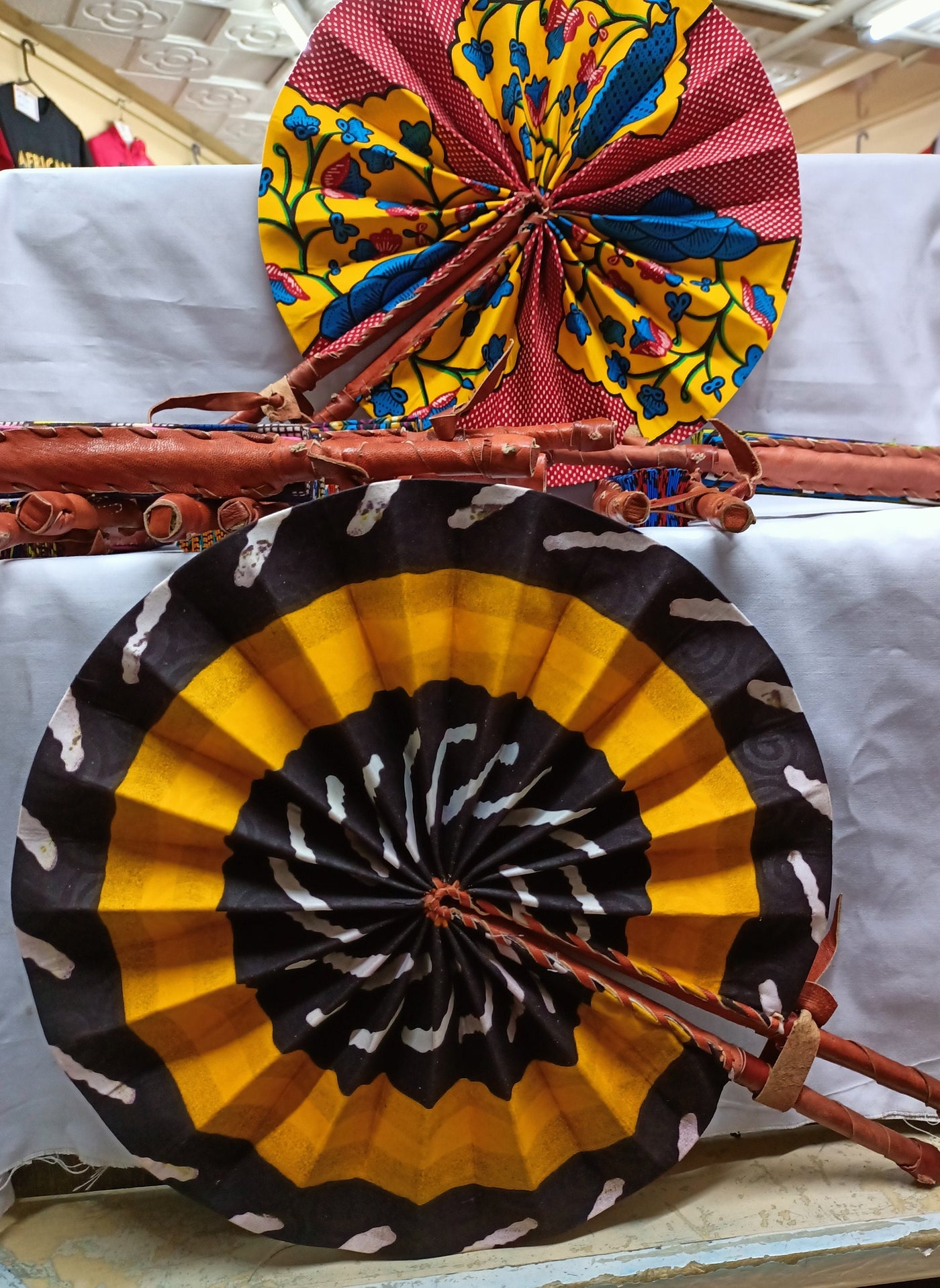 ONSALE.Wholesale Random Ankara Folding fabric fans Set of 185. kente African Hand fan/ Gift Items Fabric leather fan. African Folding Fans.